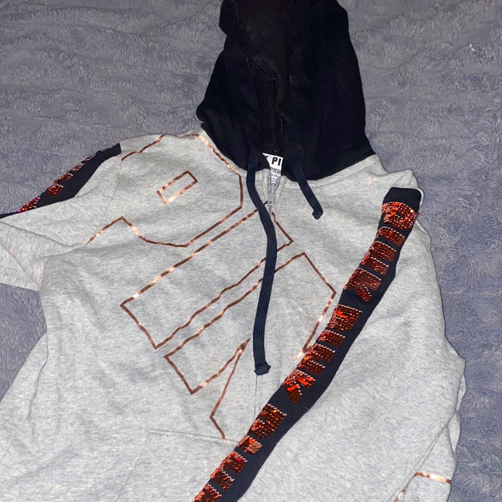 small pink zip up
